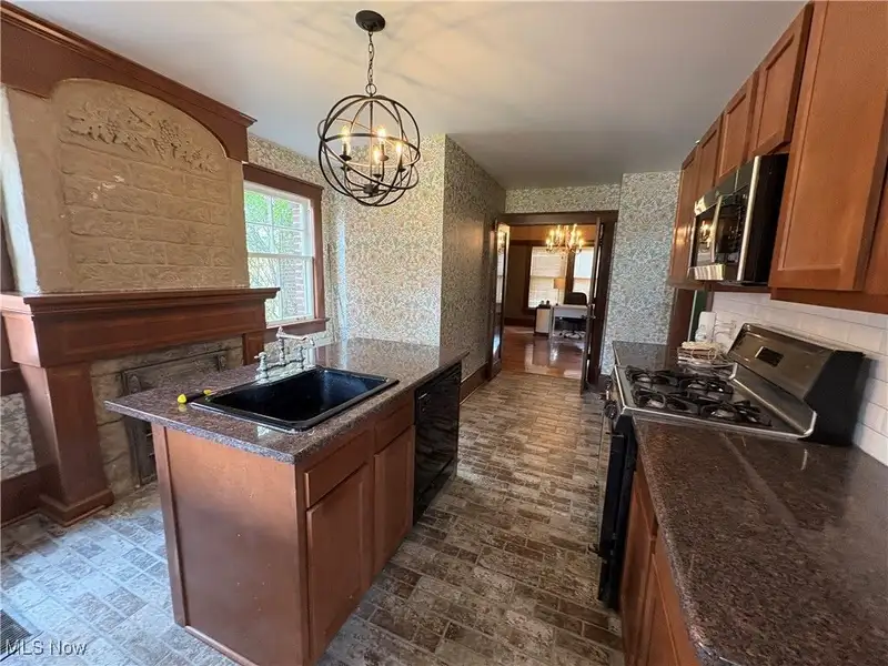 Updated Tudor Office Building with Residential Potential in Canton Near Downtown