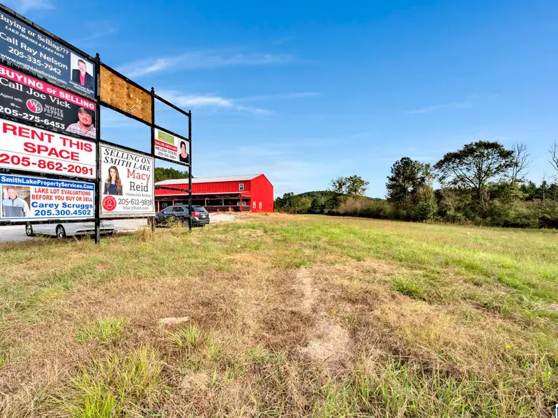 Prime Commercial Property Near Smith Lake with 3,800 Sq Ft Building and Billboard Income