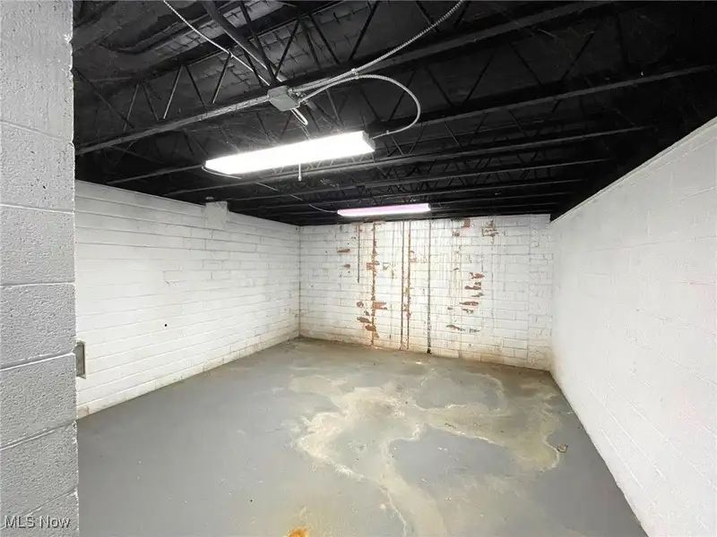 Well-maintained Two-story Brick Building with Retail and Workshop Space in Ne Location