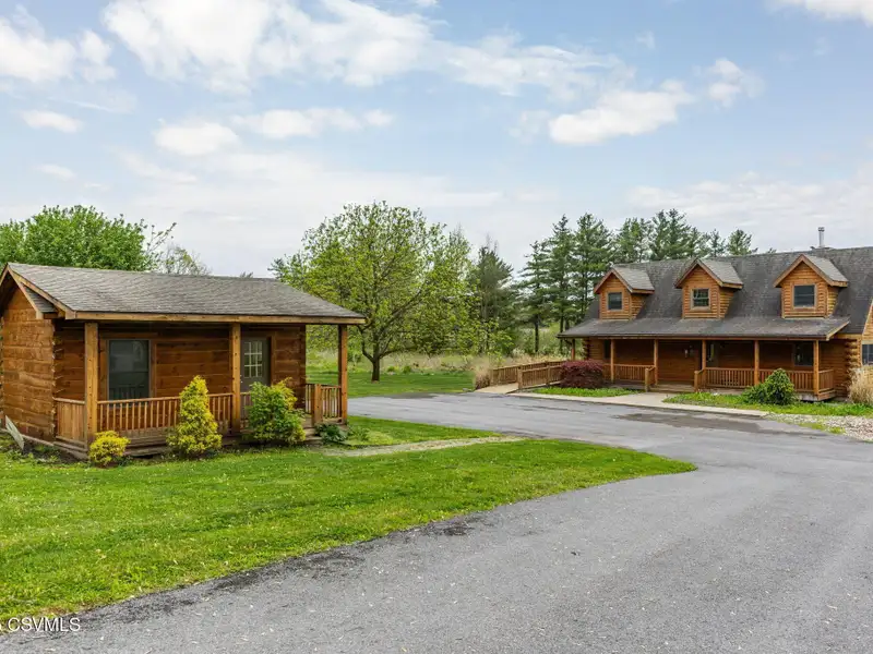 Commercial Log Home on 2 Acres with 3 Bedrooms and Scenic Views
