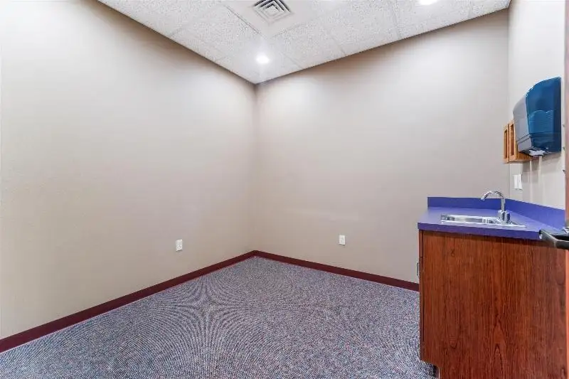 Versatile Commercial Condo for Sale Near Hwy 151 & 41 with Multiple Offices and Amenities