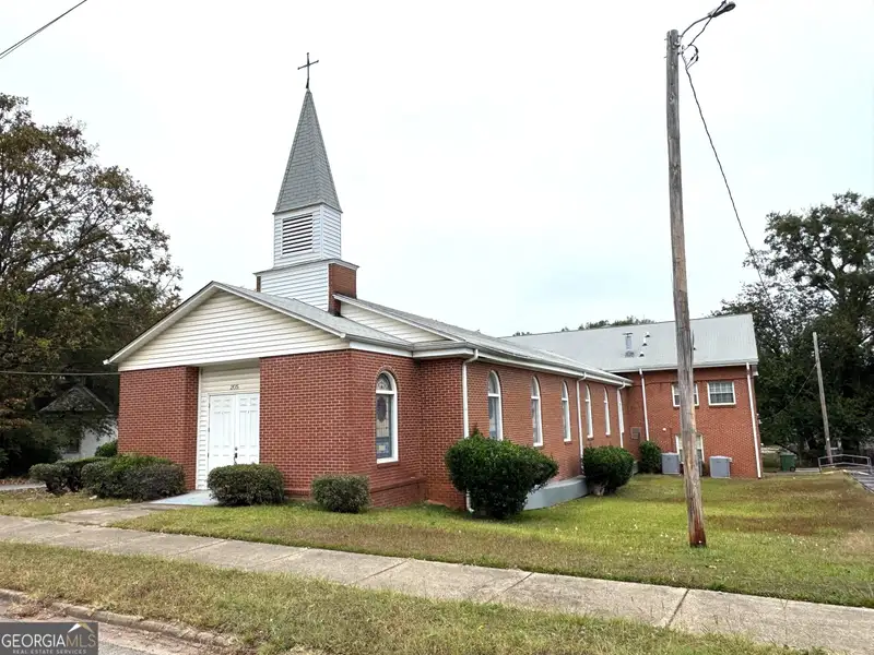 Multi-use Church Property with Sanctuary, Classrooms, Fellowship Hall, and Ample Parking