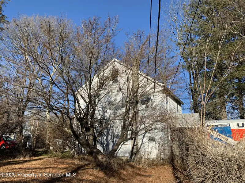 2 Acres of Commercial Property with 3-bedroom House in High-traffic Location
