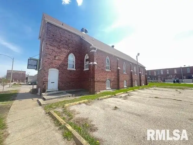 Historic Church Property for Sale in Desirable Neighborhood with Versatile Community Spaces