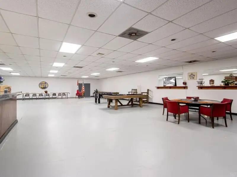 Office Space with Meeting Area, Kitchen, and Security Features in Convenient Location