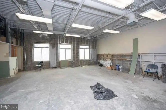 Versatile 6,000 Sq Ft Commercial Space in Prime Location with Parking Potential