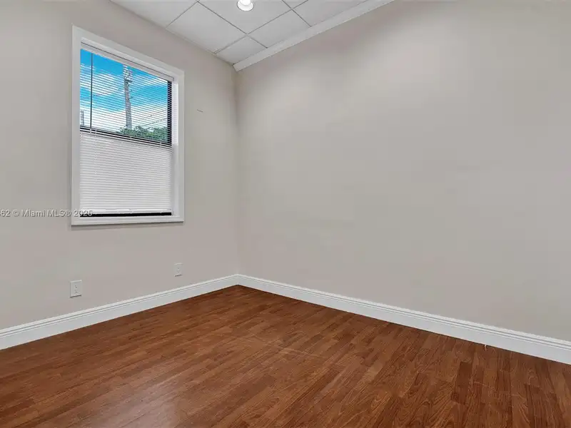 Renovated Office Building with 24 Surface Parking Spaces, On-site Management