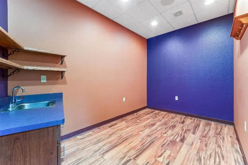 Versatile Commercial Condo for Sale Near Hwy 151 & 41 with Multiple Offices and Amenities