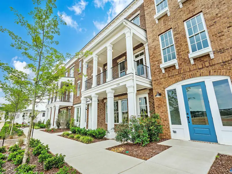 Live/work Townhome with Flex Space, Gourmet Kitchen, and 2-car Garage in Prime Location
