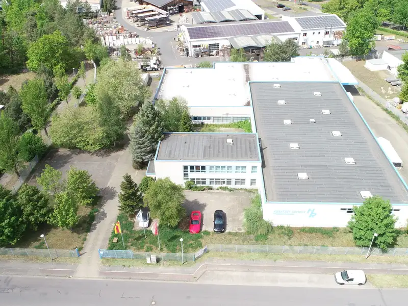 Versatile Commercial Property for Sale: 6,604 M² with Production Halls and Office Space
