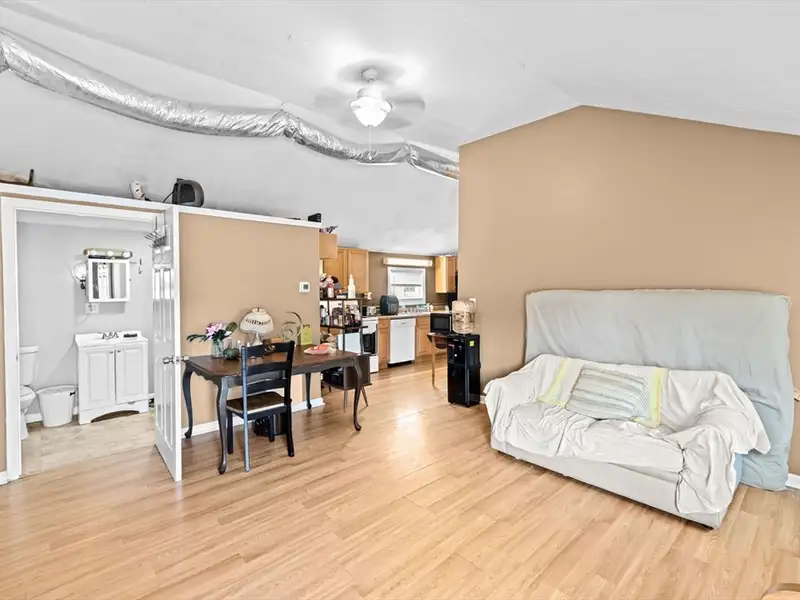 Versatile Multi-use Property with In-law Suite Potential and Heated Pool on Route 28
