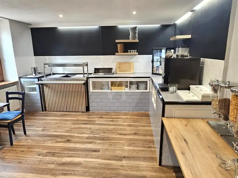 Historic Family-run Hotel in Ansbach with Restaurant, Guest Rooms, and Green Energy Features