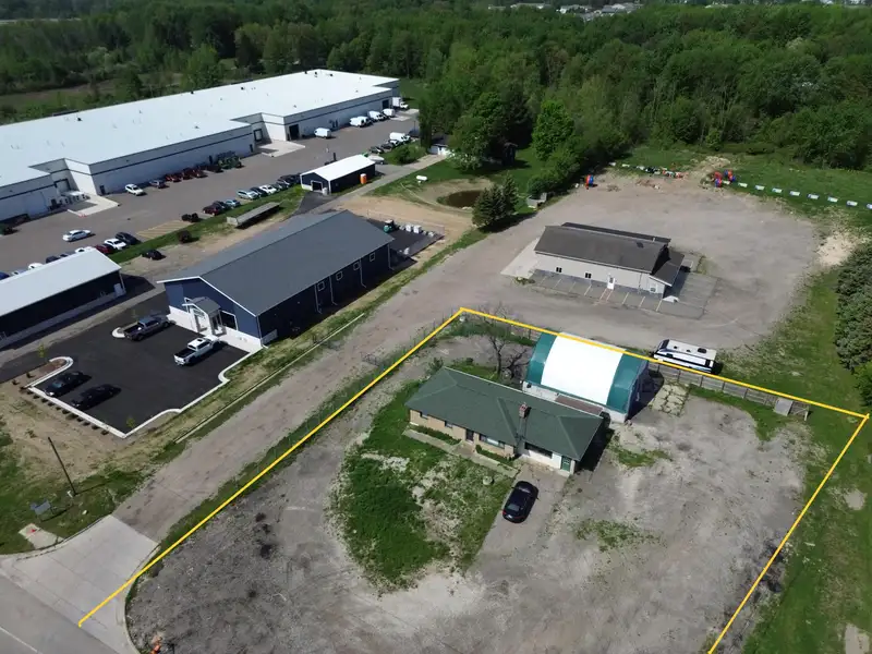 Light Industrial Zoned Property with Residential Structure in West Michigan's Developing Corridor
