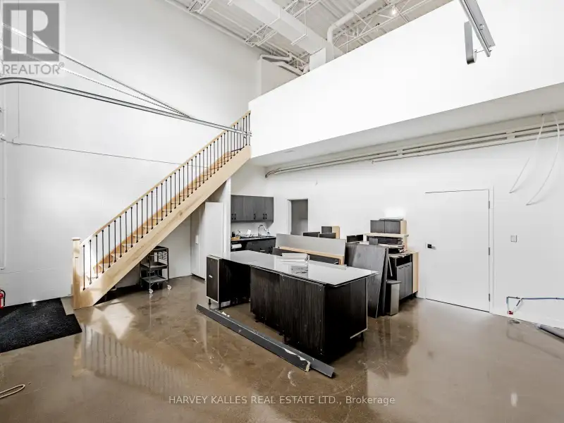 Fully Leased Commercial Condo in Prime Location on the Queensway