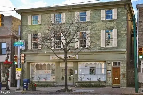 Historic Multi-use Building in Chestnut Hill Business District with Retail and Residential Units