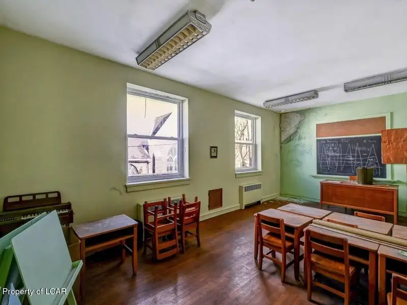 Versatile Downtown Hazleton Building: Former Worship Space with Offices/classrooms Potential