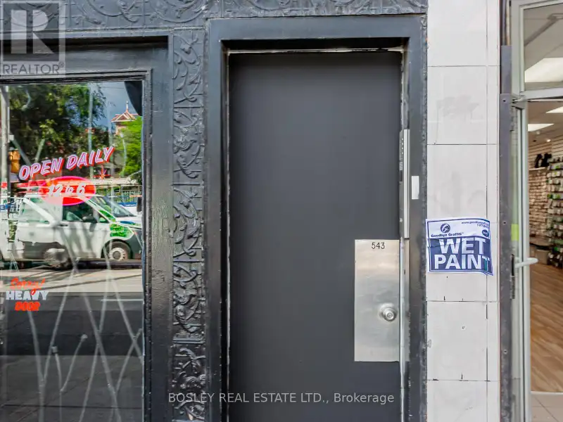 Charming Two-storey Apartment in Landmark Building on Queen St West