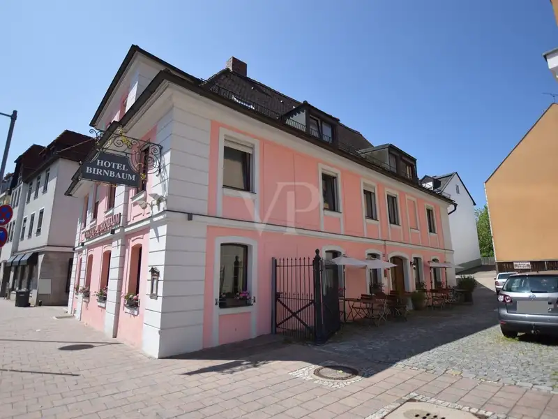 Historic Family-run Hotel in Ansbach with Restaurant, Guest Rooms, and Green Energy Features