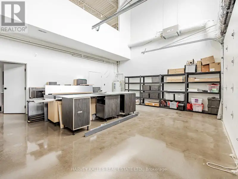 Fully Leased Commercial Condo in Prime Location on the Queensway
