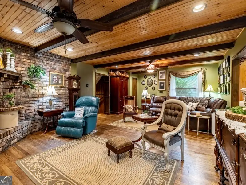 27 Acres with 2,400 Sq. Ft. Home, Duplexes, Pool, and Barn in Prime Location