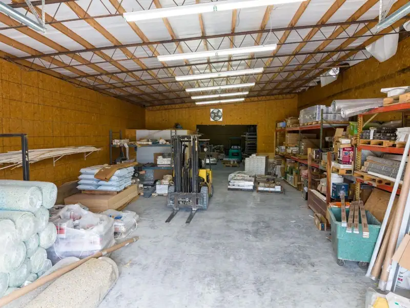 Large Commercial Building on Highway 412e in Parsons with Extensive Frontage and Warehouse Space