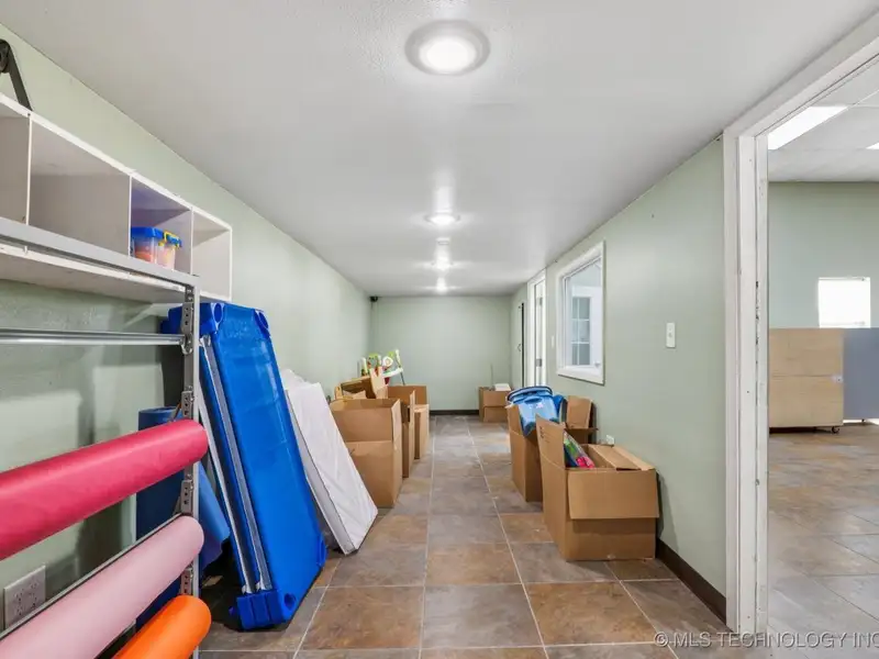 Turnkey Commercial Daycare Property in Downtown Fort Gibson with Dual Buildings and Equipment