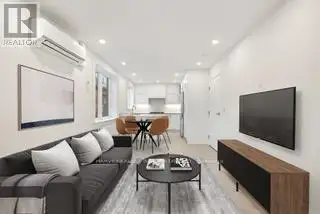 Renovated 2nd Floor Condo in Mid-town Toronto with Luxury Finishes and Modern Amenities