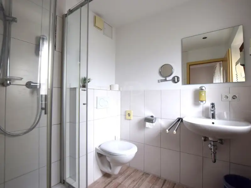 Historic Family-run Hotel in Ansbach with Restaurant, Guest Rooms, and Green Energy Features