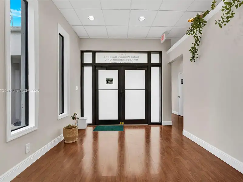 Renovated Office Building with 24 Surface Parking Spaces, On-site Management