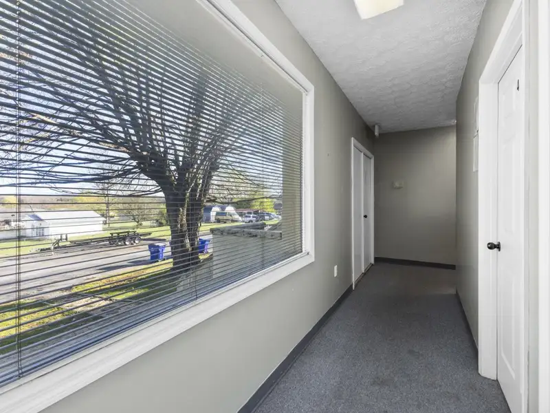 Versatile 4,305 Sq Ft Office Building with Apartment on Highway 11e