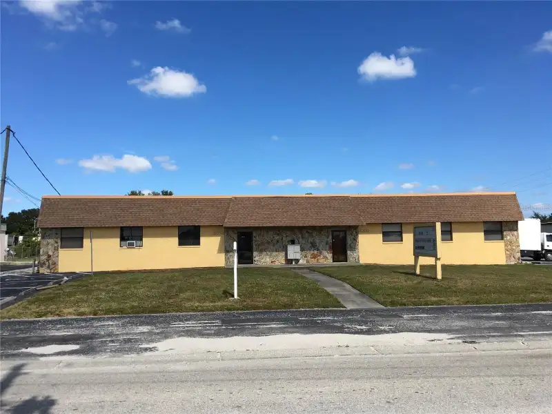 Industrial Property for Sale in Clearwater: Two Buildings with Office Space and Garage Access