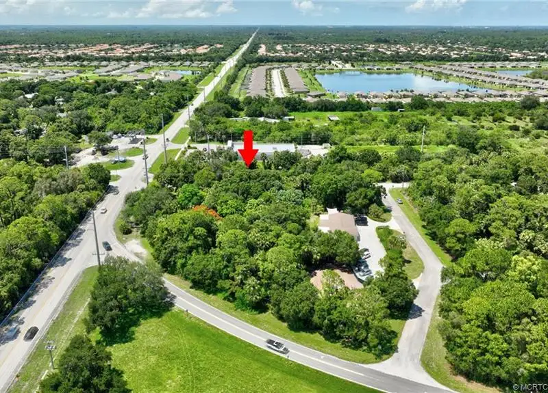 Commercial Corner Lot with Existing Residence in Lakewood Park, 31,140 Sq Ft
