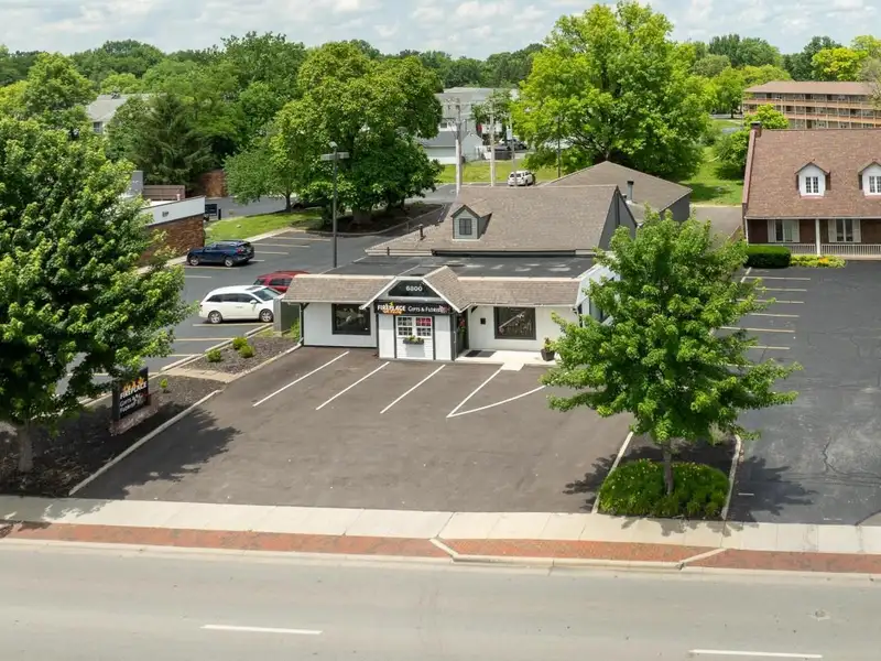 Prime Commercial Building in Downtown Reynoldsburg with Parking and Industrial Garage