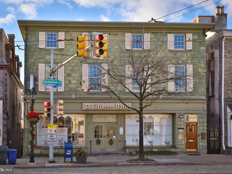 Historic Multi-use Building in Chestnut Hill Business District with Retail and Residential Units