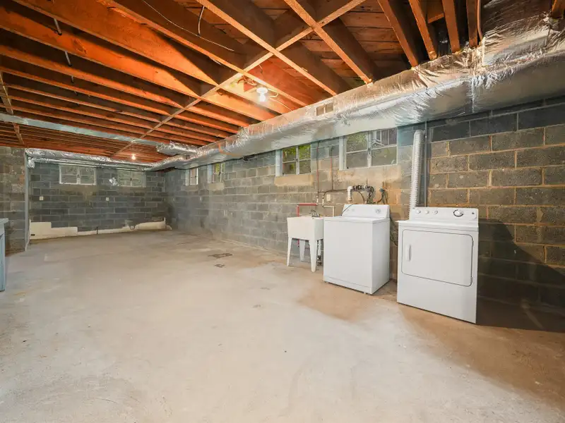 Prime 2.58-acre Multifunctional Property with Ranch Home and Outbuildings Near High-traffic Area
