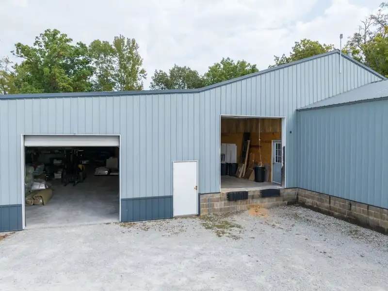 Large Commercial Building on Highway 412e in Parsons with Extensive Frontage and Warehouse Space