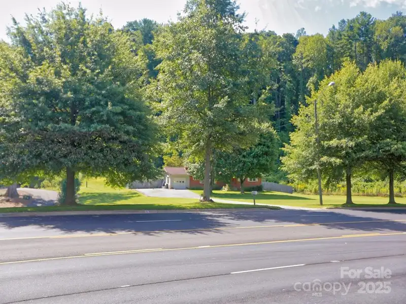 Prime 1.8 Acre Commercial Property with Home in Waynesville, Nc on Major Corridor