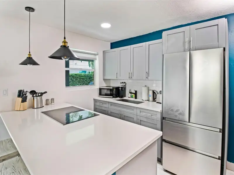 Fully Renovated Five-plex in Victoria Park with Development Potential and Strong Income.