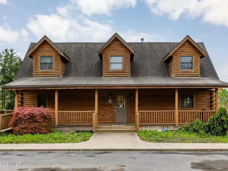 Commercial Log Home on 2 Acres with 3 Bedrooms and Scenic Views