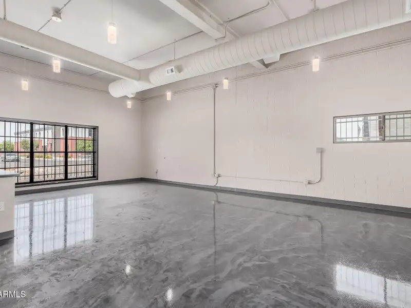 Versatile Commercial Property with Two Buildings and Ample Parking in Prime Location