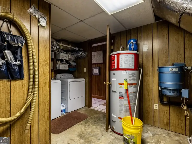 27 Acres with 2,400 Sq. Ft. Home, Duplexes, Pool, and Barn in Prime Location
