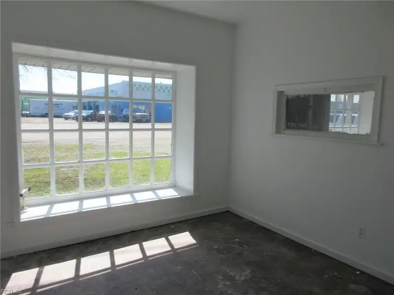 2-story Commercial Building with Office, Warehouse, and Apartments in W Pembroke