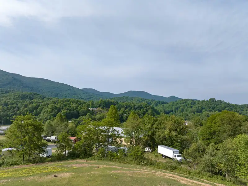 Historic 1918 Stone Building with 3.99 Acres and Detached Workshop in Balsam Road Area