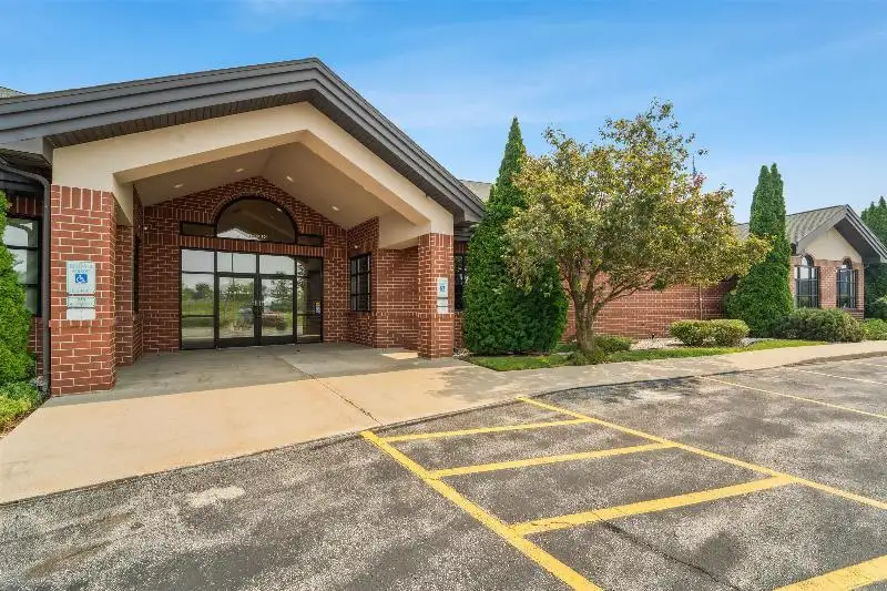 Versatile Commercial Condo for Sale Near Hwy 151 & 41 with Multiple Offices and Amenities