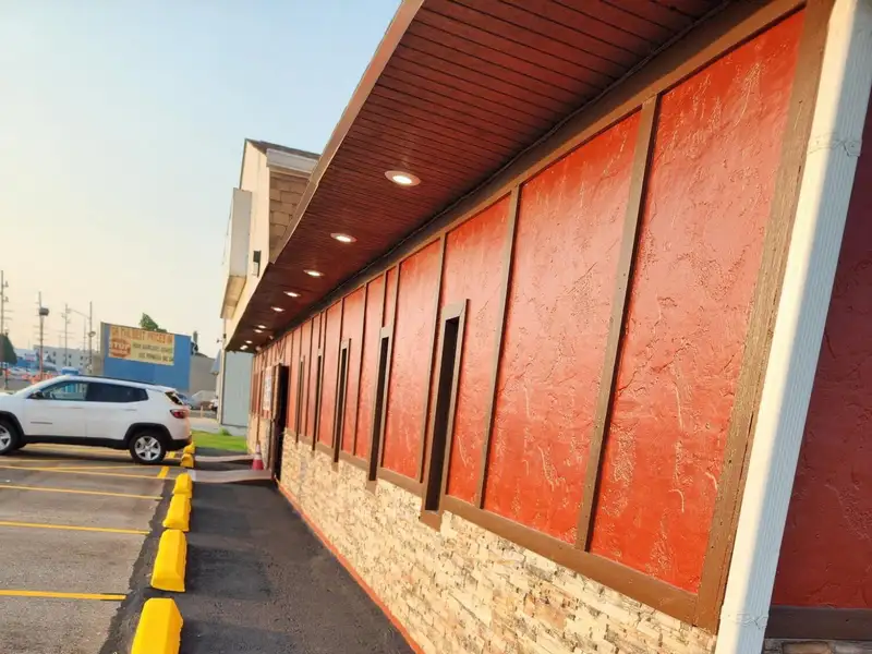 Turnkey Restaurant and Bar with Income-generating Tenants on Prime .62-acre Lot