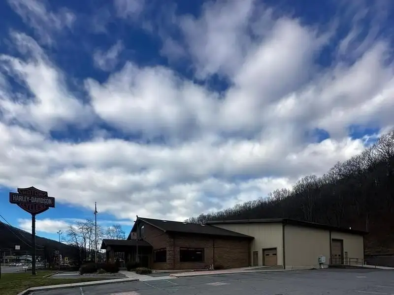 Versatile Commercial Property with Showroom, Offices, and Large Metal Building in Prime Location