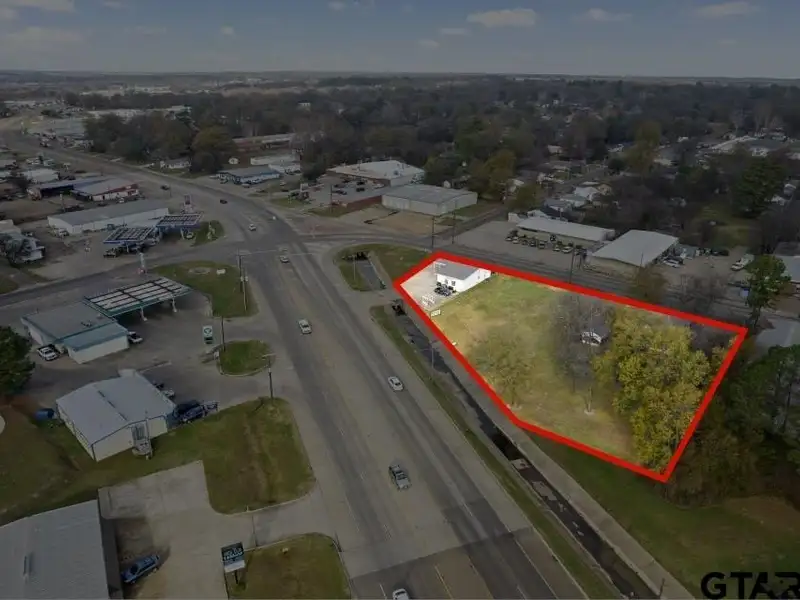 Prime Commercial Property with Building and Home on Half Acre Lot