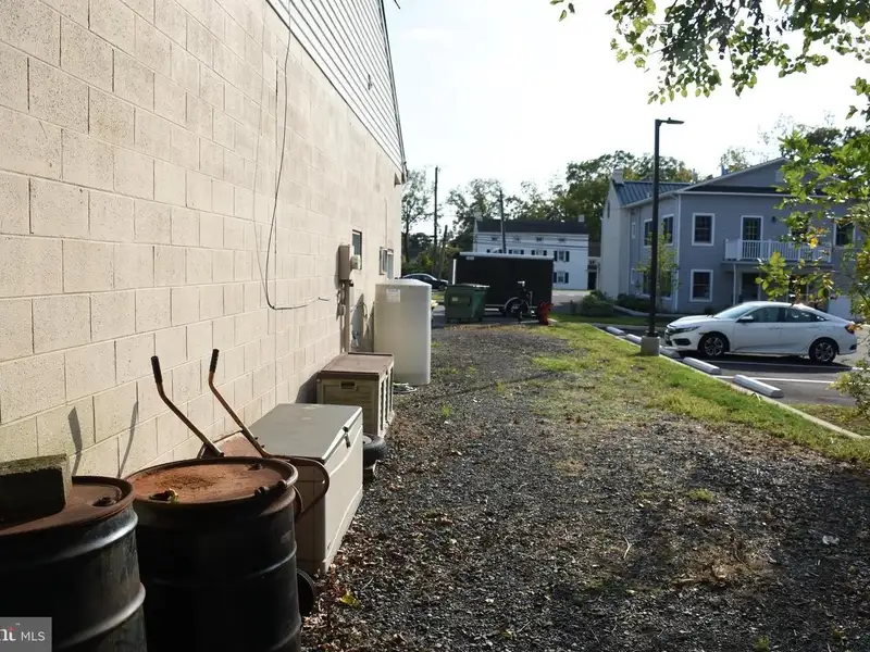 Versatile 3000+ Sq Ft Commercial Space in Prime Village Location with Auto Repair Facilities