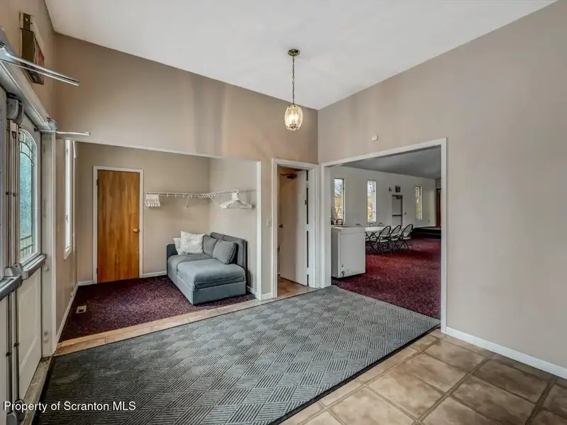 Versatile Former Church Building in Peaceful Location with Ample Parking and Creative Potential