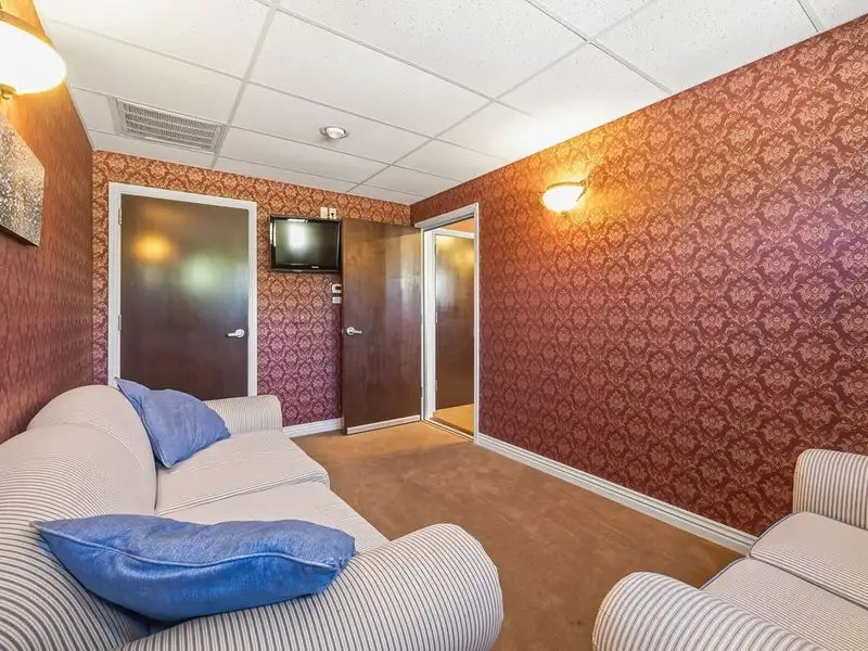Versatile 2,752 Sq Ft Office Building in Central Rogers with Five Private Offices